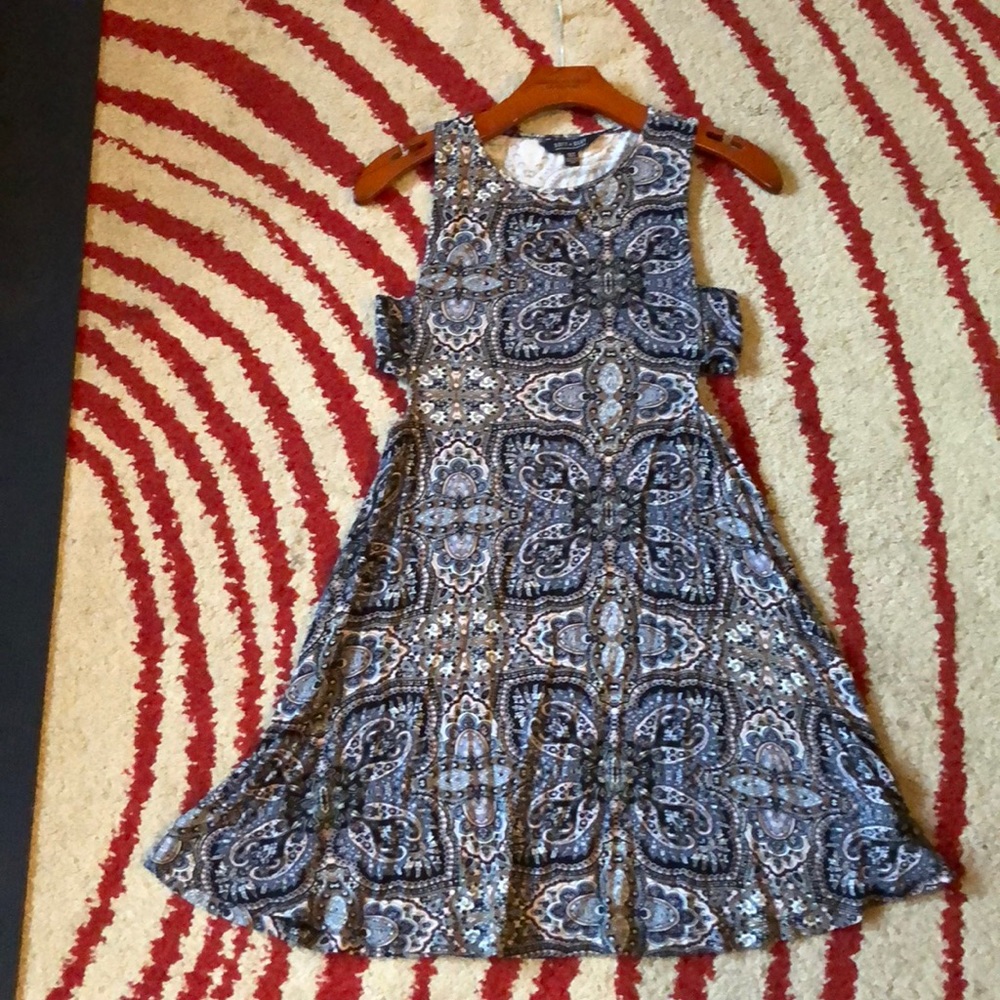 Super cute mini dress with fun cutout on the sides